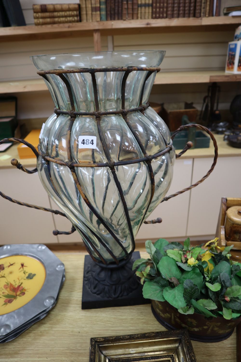 An oval painted tole monteith shape planter, width 32cm., a spice rack, a large glass and wrought metal vase, 62cm, and two other items